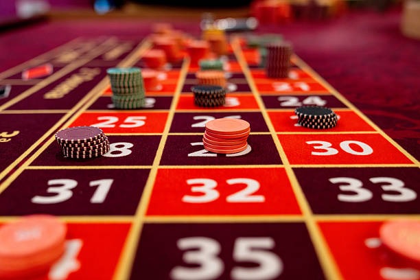 Casino Hold'em live dealer table with community cards and player interface